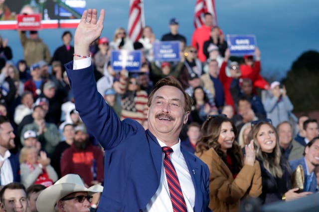 <p>Mike Lindell attends a Trump rally </p>