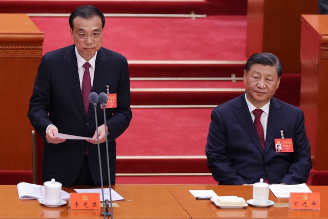 <p>Chinese premier Li Keqiang (left) and Chinese president Xi Jinping (right) attend the opening session of the 20th National Congress of the Communist Party of China in Beijing, China</p>