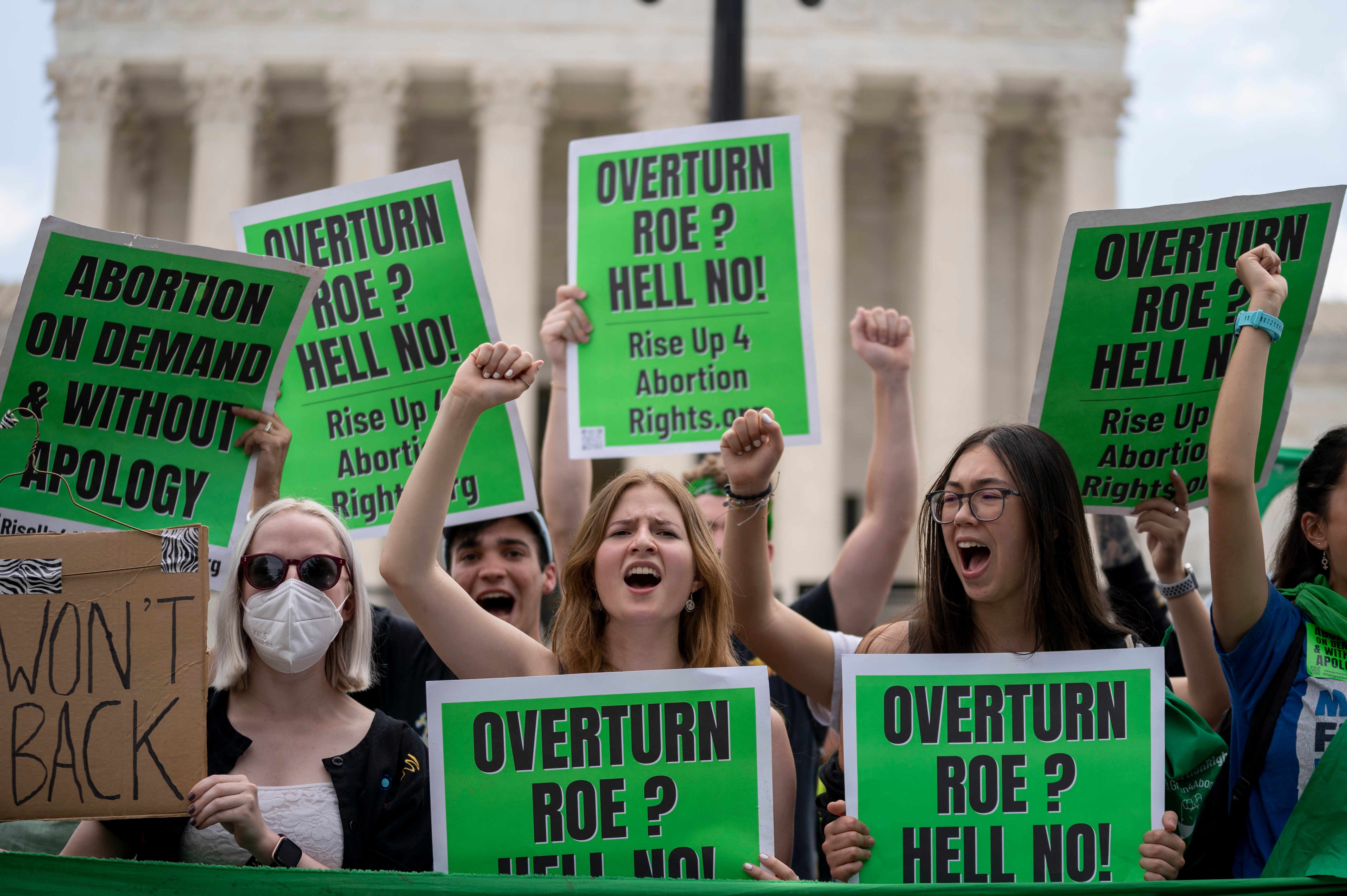 Abortion-rights protesters regroup and protest following Supreme Court's decision to overturn Roe v. Wade in Washington, Friday, June 24, 2022.