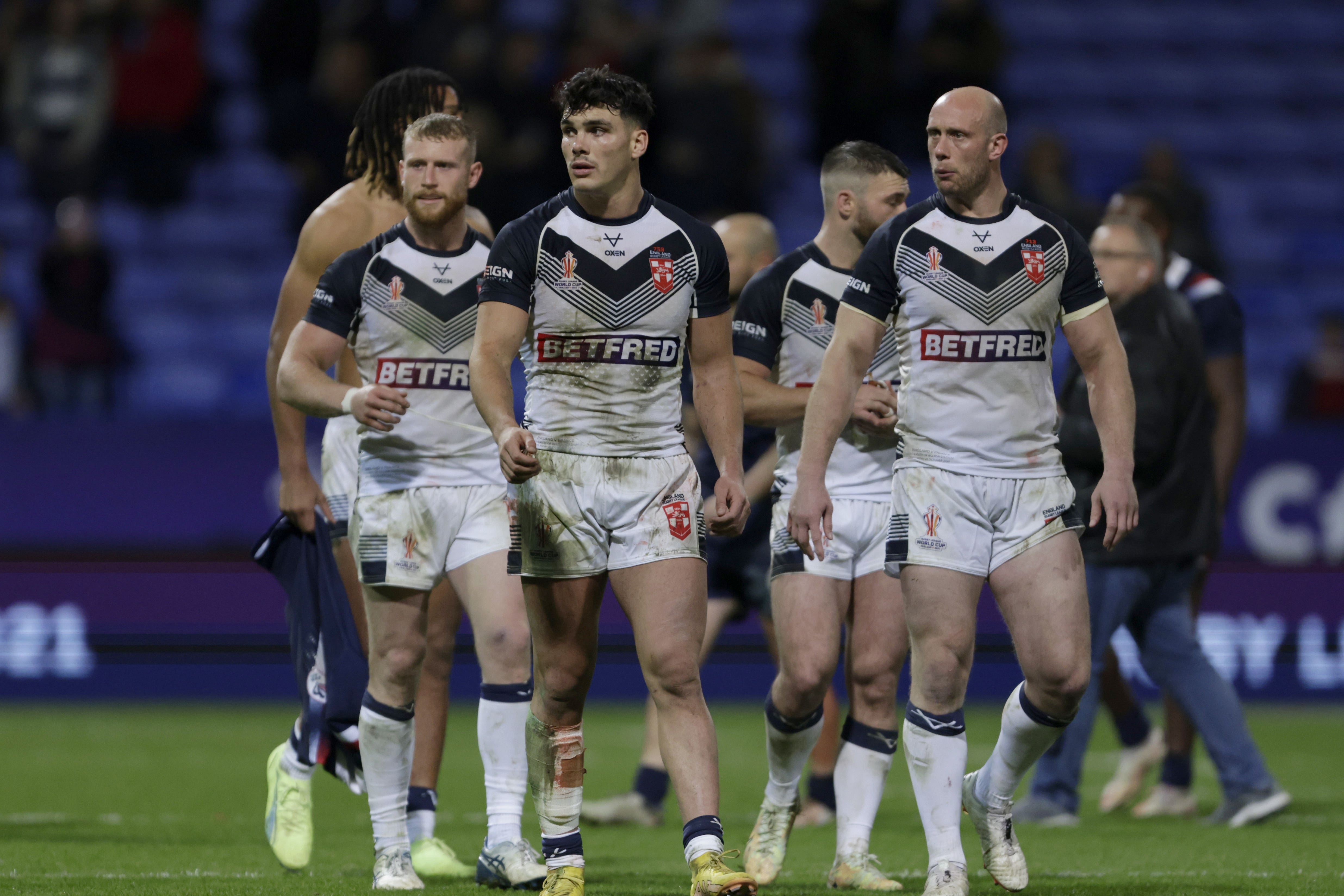 England’s players celebrate after beating France (Richard Sellers/PA)