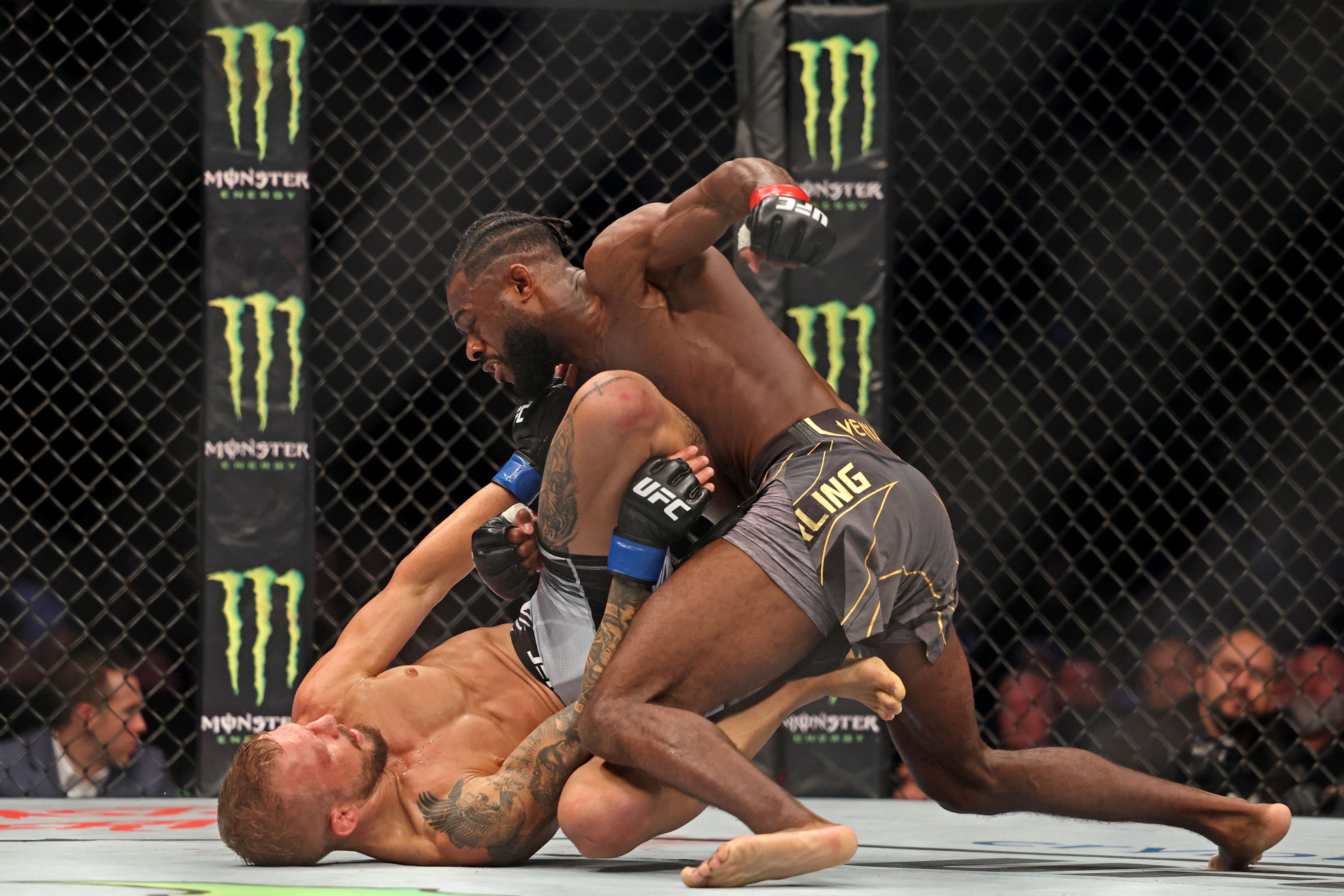 Aljamain Sterling (right) retained the bantamweight title with a TKO of TJ Dillashaw
