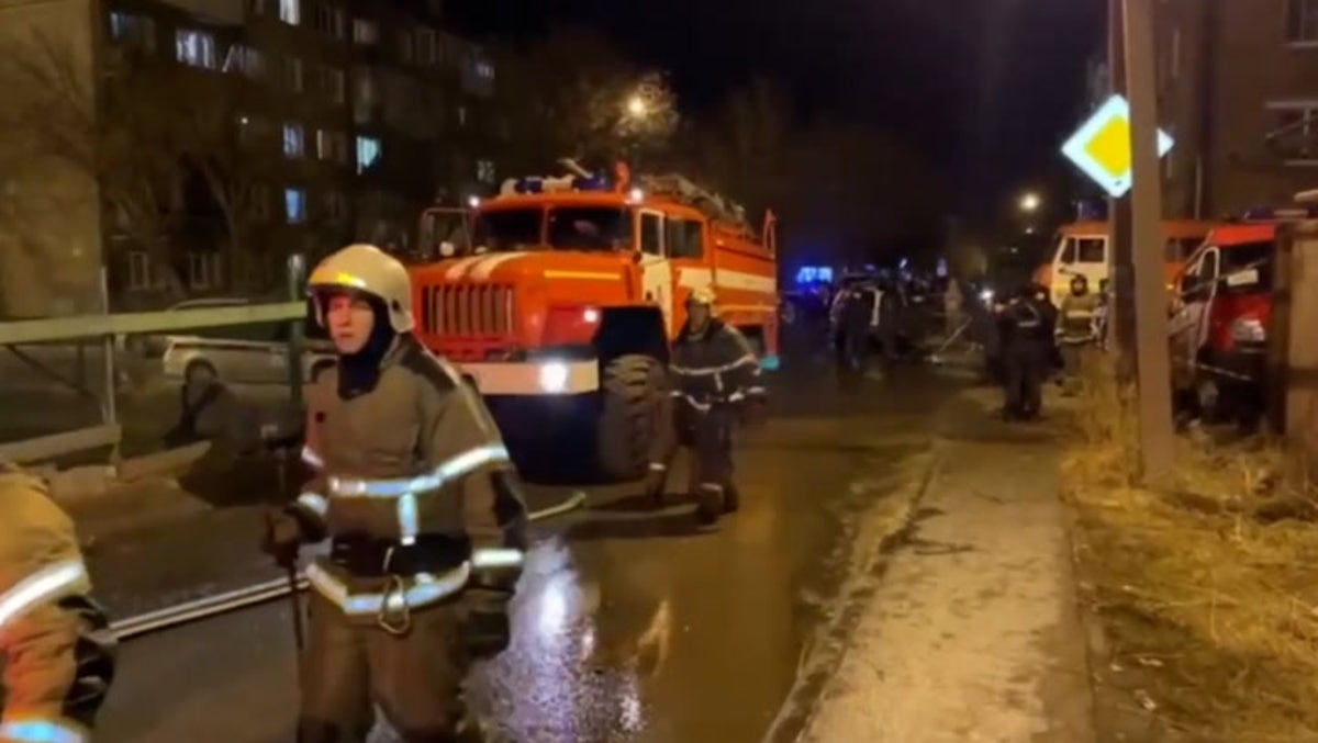 Firefighters attend aftermath of Russian jet crash in Siberia