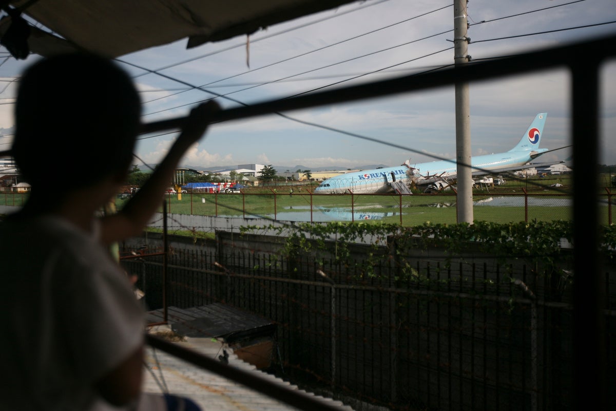 Philippine airport partially reopens despite stuck plane