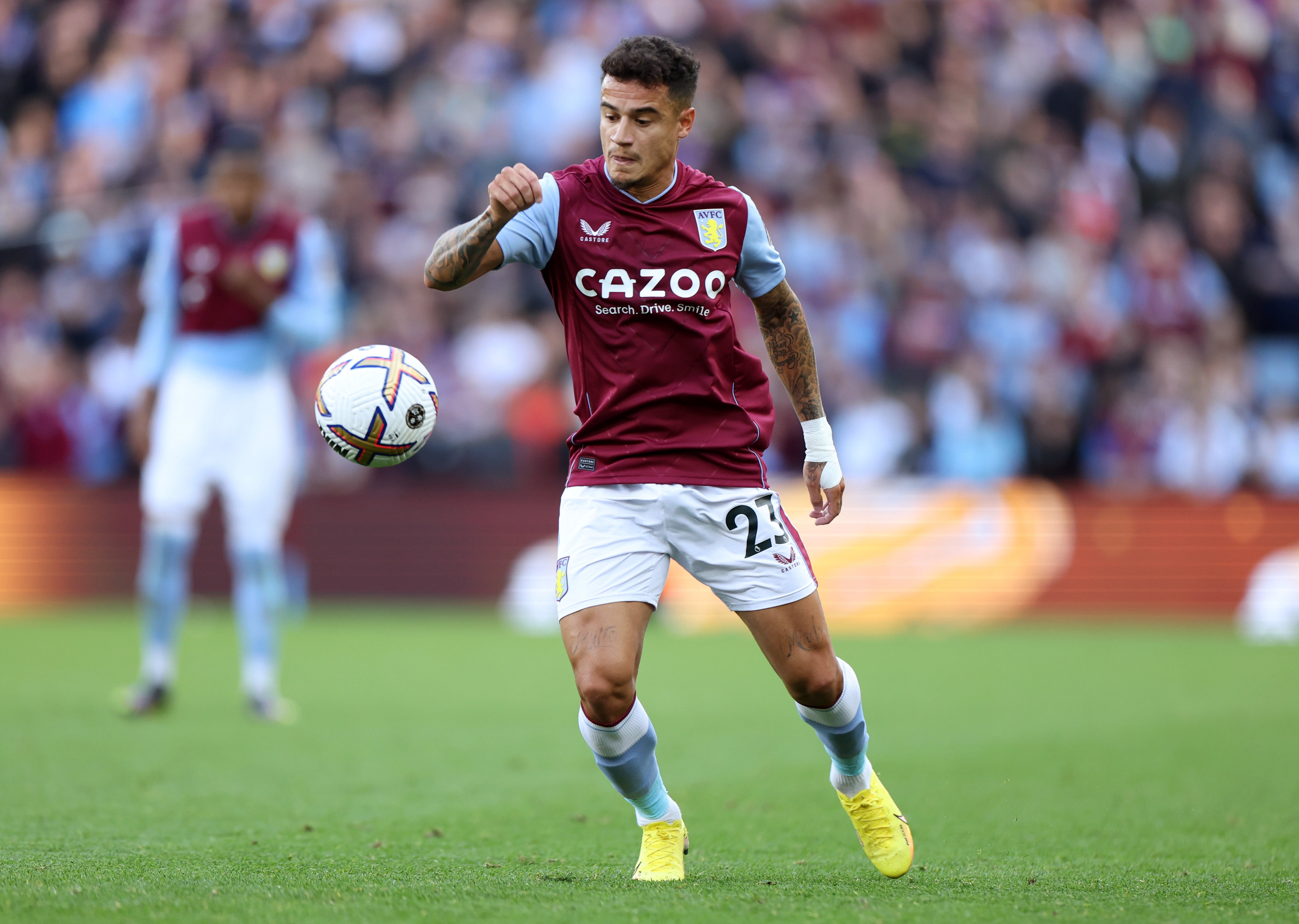 Philippe Coutinho of Aston Villa in action against Brentford