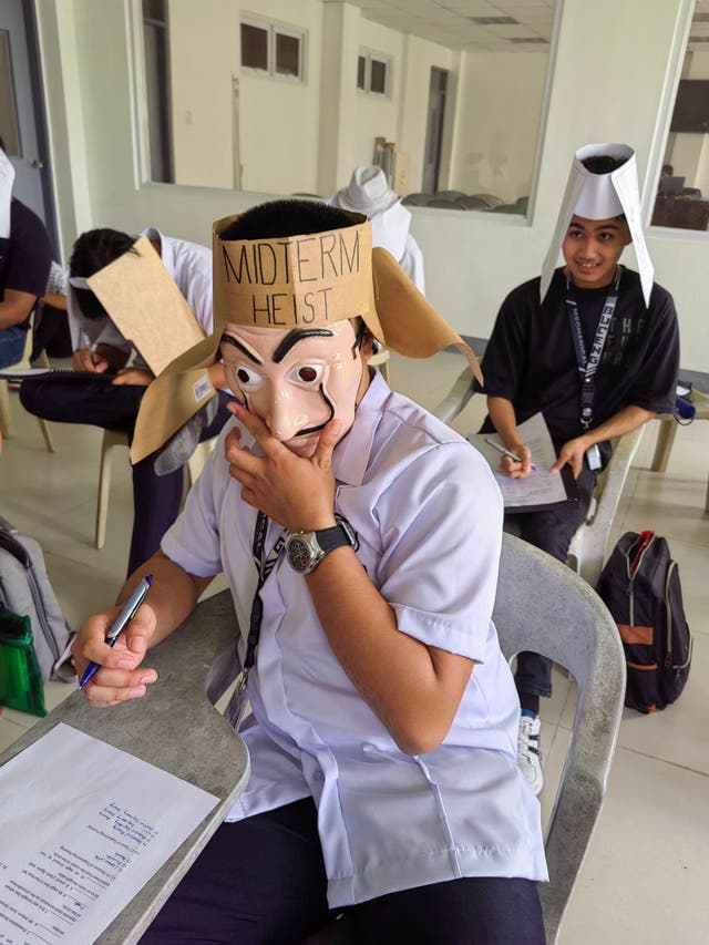 <p>‘Anti-cheating’ masks, hats and helmets worn by Filipino students. Photo shared by Mandane-Ortiz R Mary Joy</p>