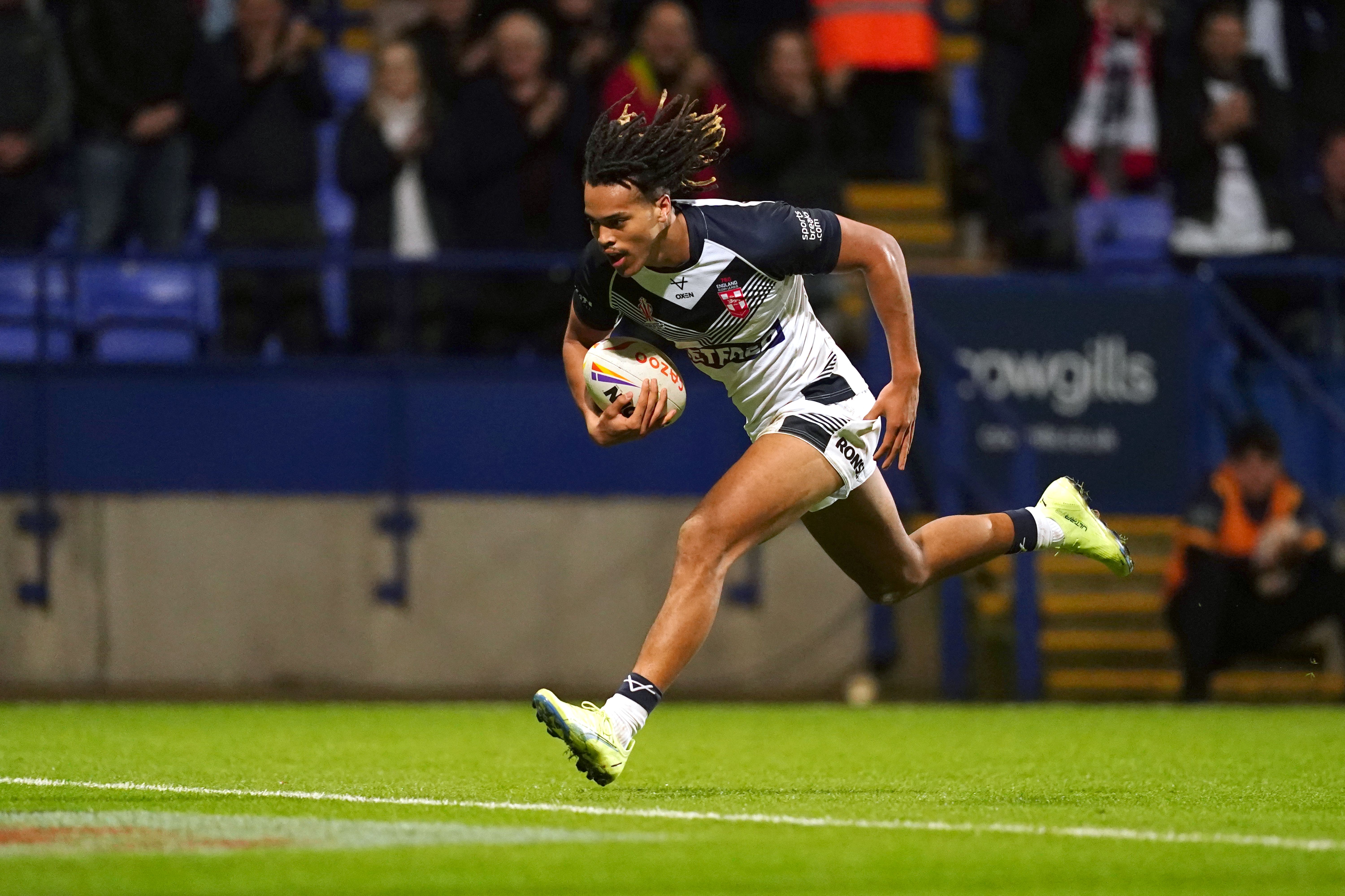 Dom Young in try-scoring mode for England (Martin Rickett/PA)