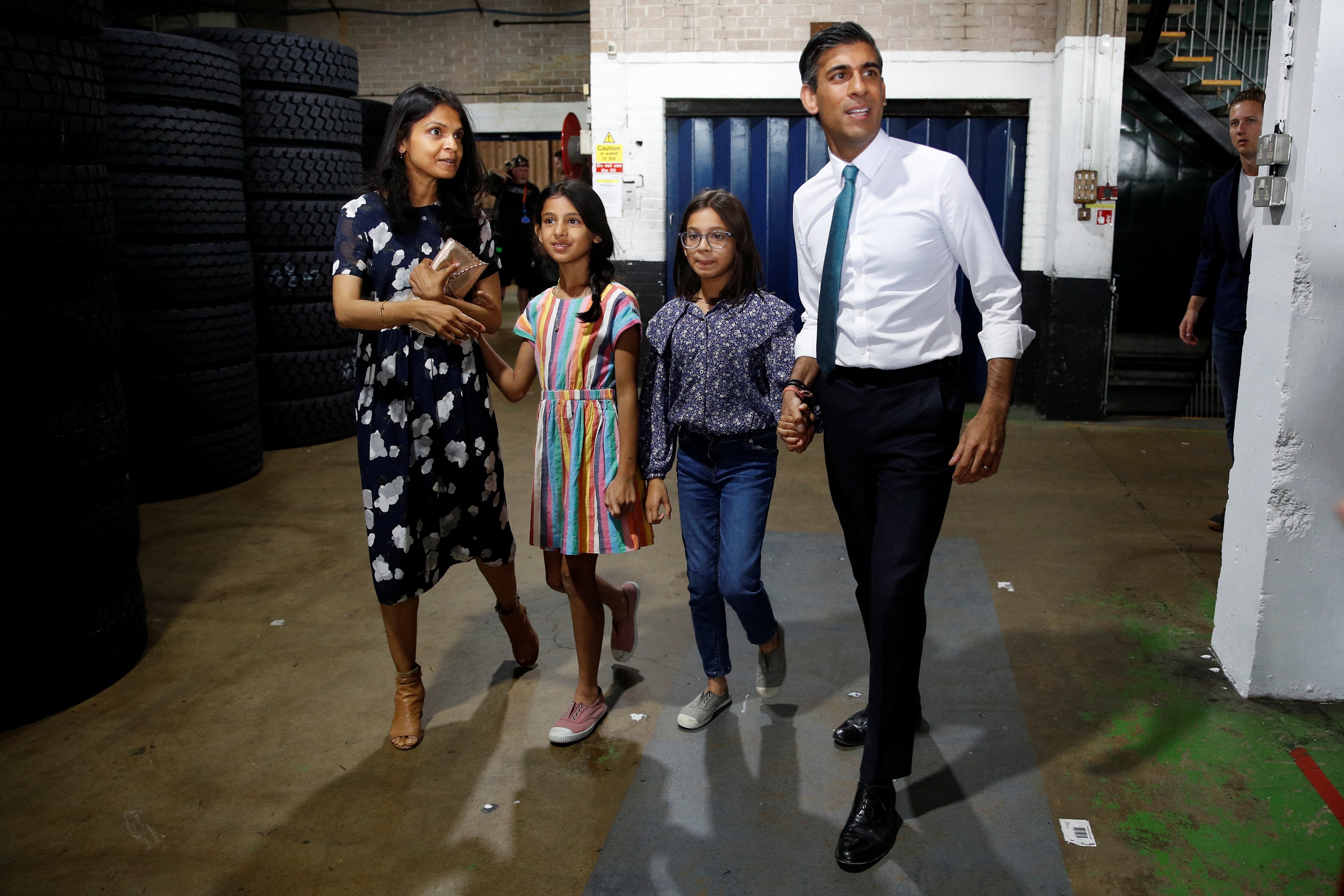 Rishi Sunak, his wife Akshata Murthy and their daughters Anoushka and Krishna attend a Conservative Party leadership campaign event in Grantham
