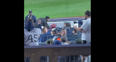 Ted Cruz is seen getting booed and flipped off at Yankee Stadium amid shouts of ‘go back to Cancun’