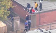 Disturbing videos show police helping terrorised students escape shooting at St Louis high school