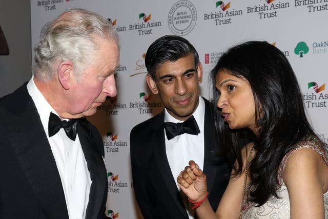 <p>King Charles III, when he was the Prince of Wales, with Rishi Sunak and his wife Akshata Murthy at a British Asian Trust reception in February 2022 </p>