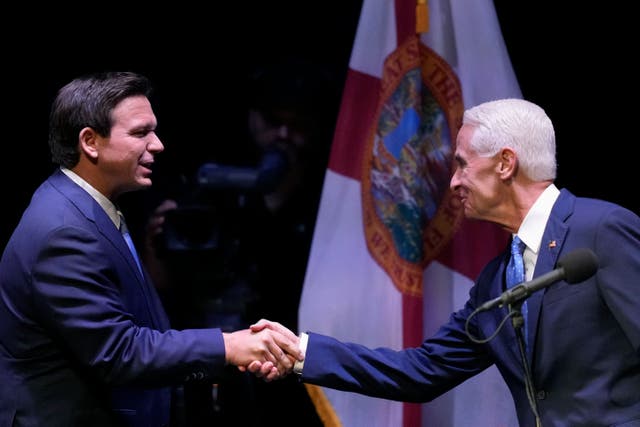 <p>Florida's Republican Gov. Ron DeSantis, left, shakes hands with his Democratic opponent Charlie Crist at the start of their televised debate, at Sunrise Theatre in Fort Pierce, Fla., Monday, Oct. 24, 2022</p>