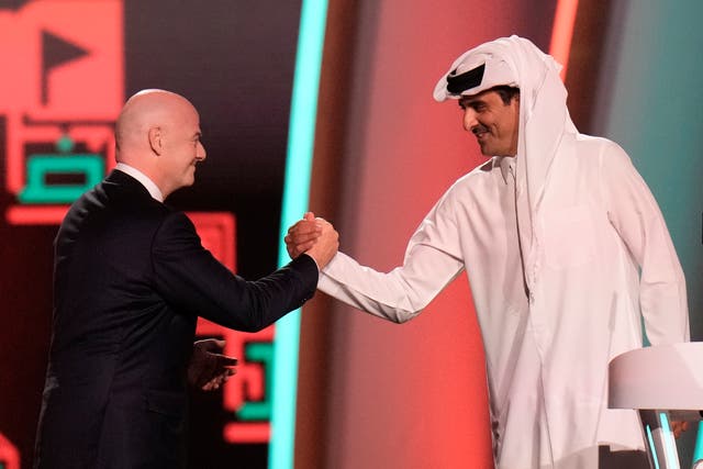 <p>Sheikh Tamim with Fifa president Gianni Infantino in Doha in April</p>