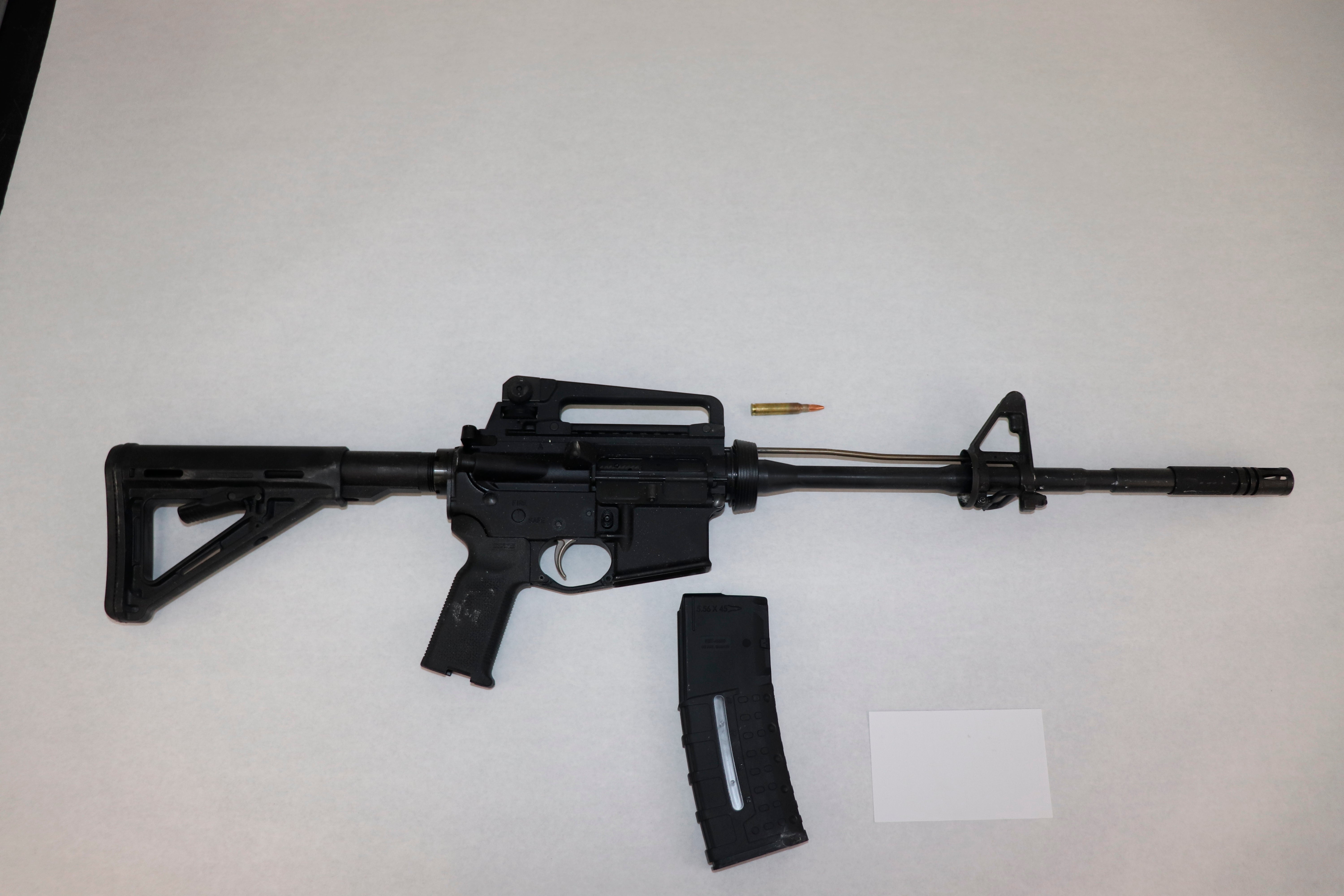 This image provided by the St. Louis Metropolitan Police Department shows an AR-15-style rifle used by a 19-year-old gunman who killed a teacher and a 15-year-old girl at a St. Louis high school on Monday, Oct. 24, 2022