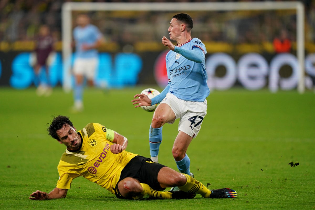 Man City progress to knockout stages despite being held by Borussia Dortmund