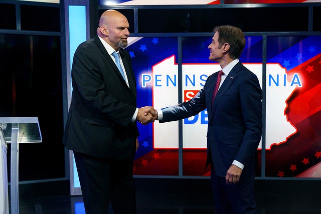<p>A handout photo made available by ABC27 shows Democratic candidate Lt. Gov. John Fetterman (left) and Republican Pennsylvania Senate candidate Dr Mehmet Oz (right) shaking hands prior to the Nexstar Pennsylvania Senate Debate at WHTM ABC27 in Harrisburg, Pennsylvania, USA, 25 October 2022</p>