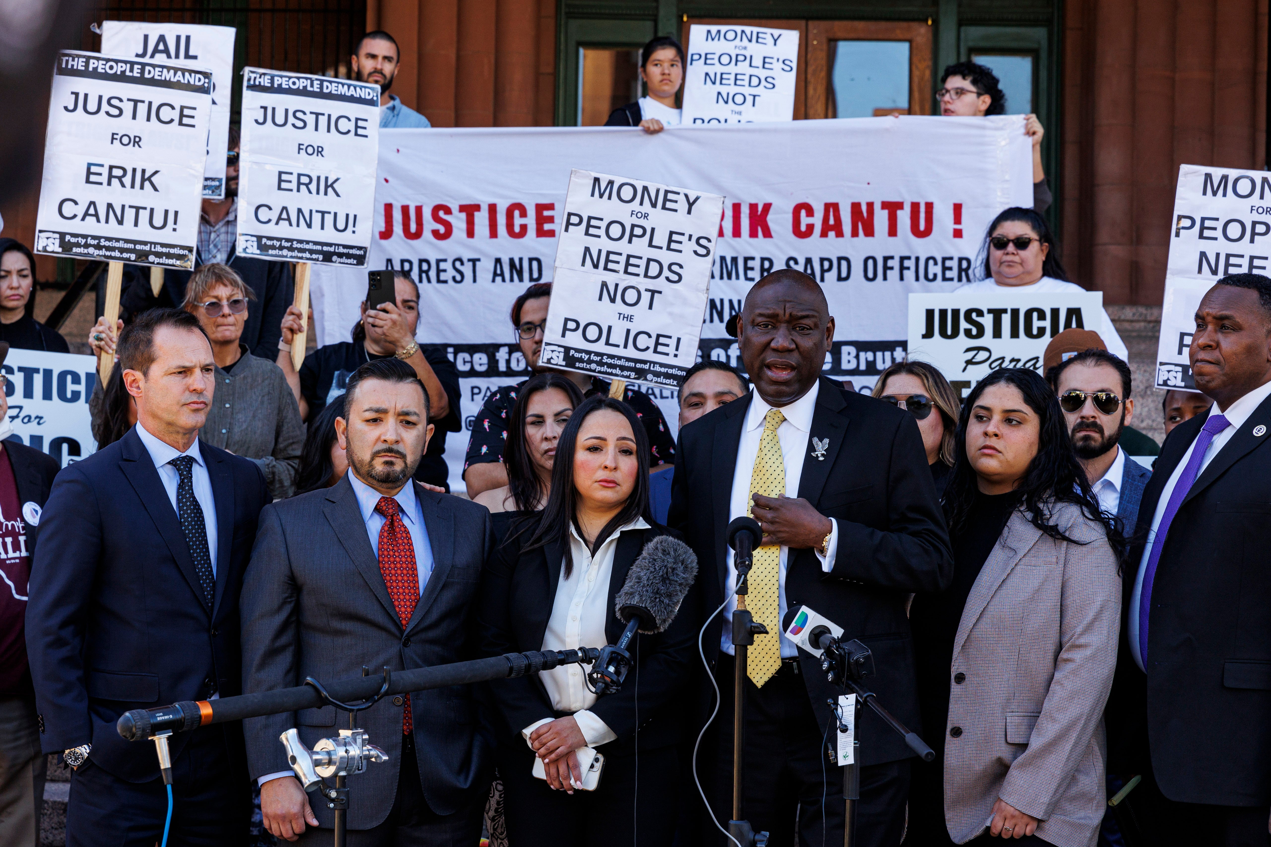 Attorney Benjamin Crump, third from right, addresses the media alongside 17-year-old Erik Cantu's family during a press conference held to update the public about his current medical condition in front of the Bexar County Courthouse in San Antonio, Tuesday, Oct. 25, 2022