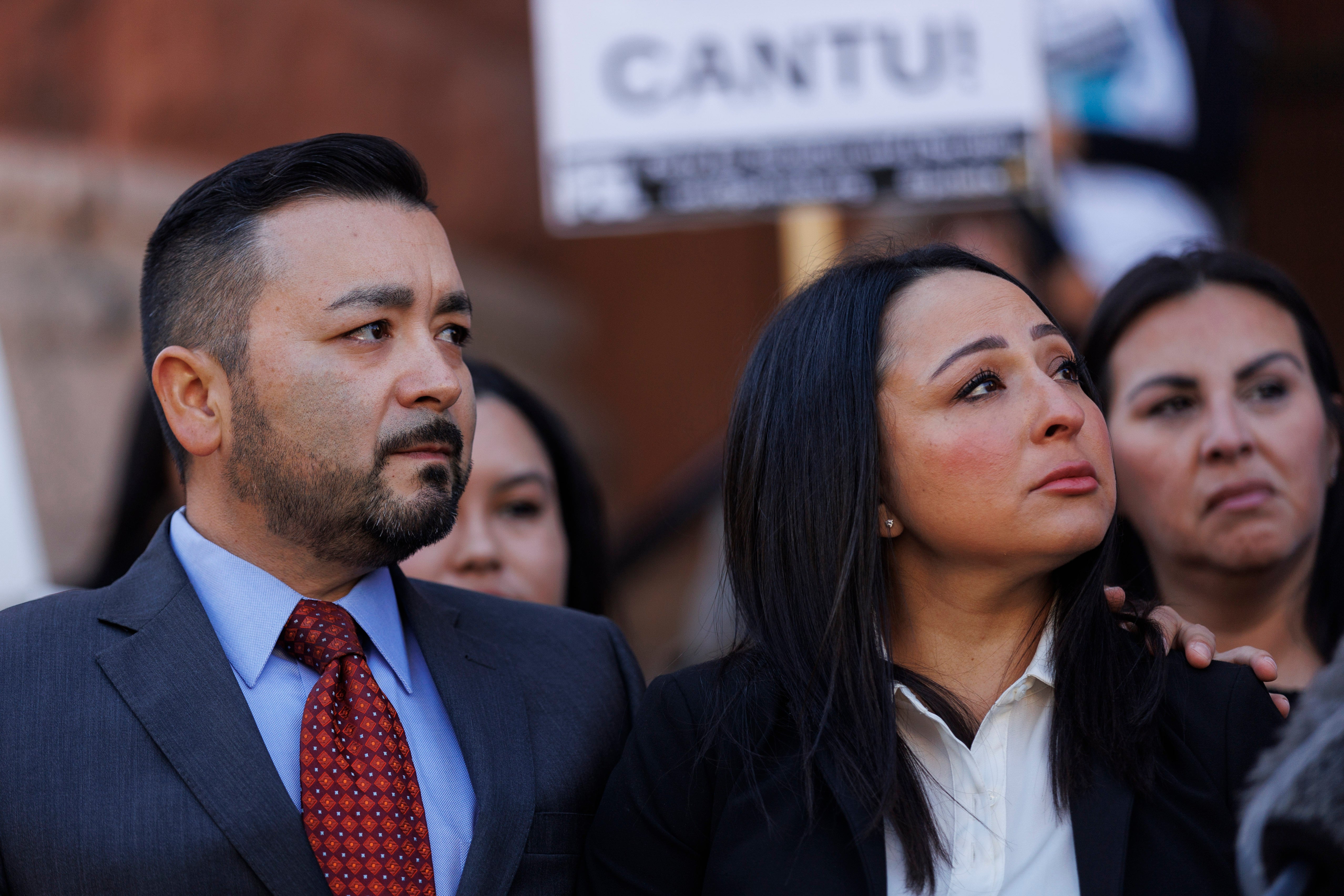 Eric Cantu Sr. and Victoria Casarez listen as Benjamin Crump, one of their attorneys, addresses the news media about their 17-year-old son Erik Cantu