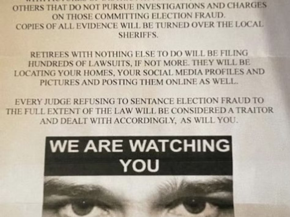 A flyer for an anonymous group called Ben Sent Us issues a warning to Democratic officials amid a wave of baseless conspiracy theories regarding voter fraud