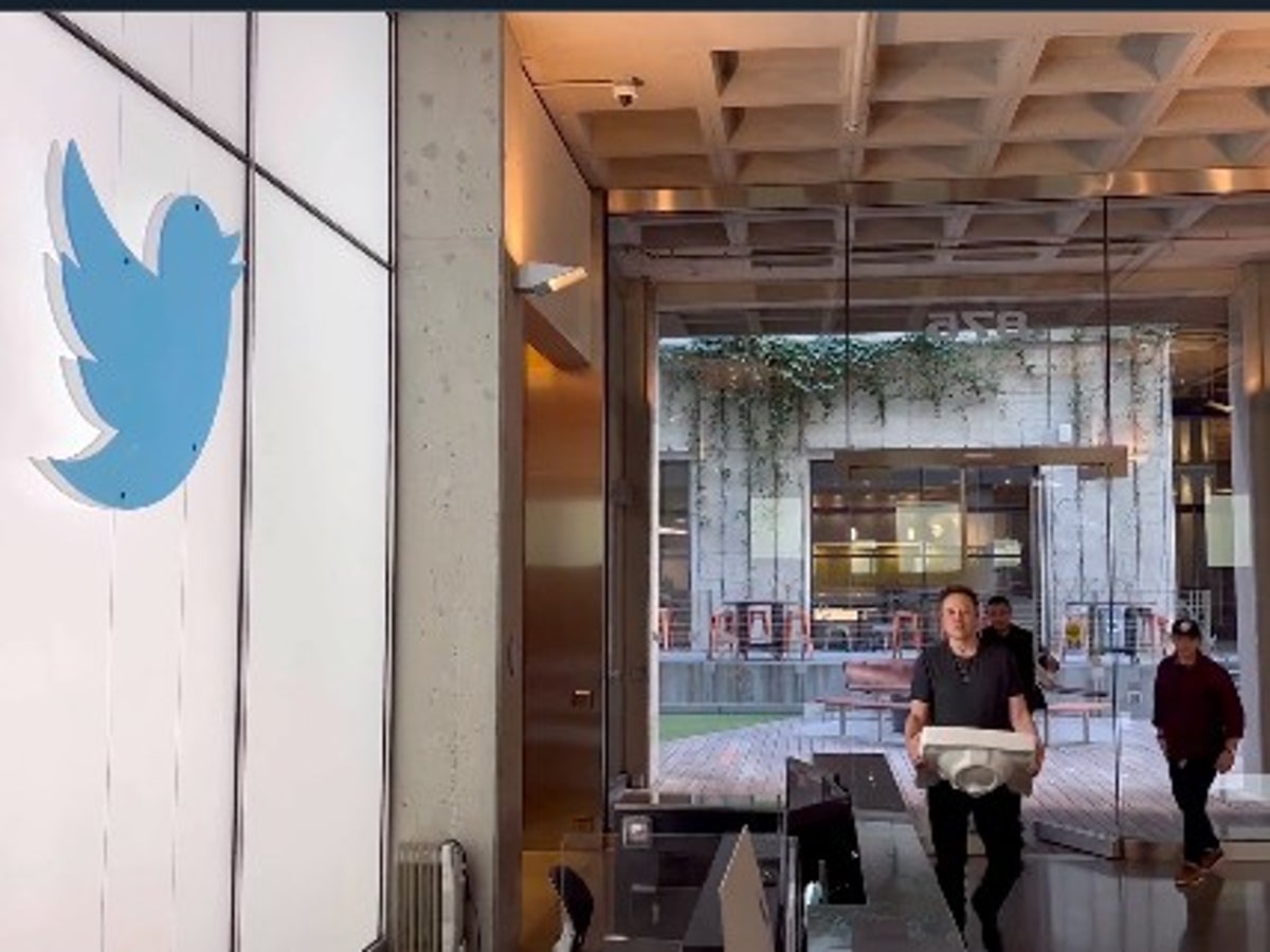 Elon Musk shows up at Twitter HQ carrying kitchen sink as he closes in on $44bn purchase