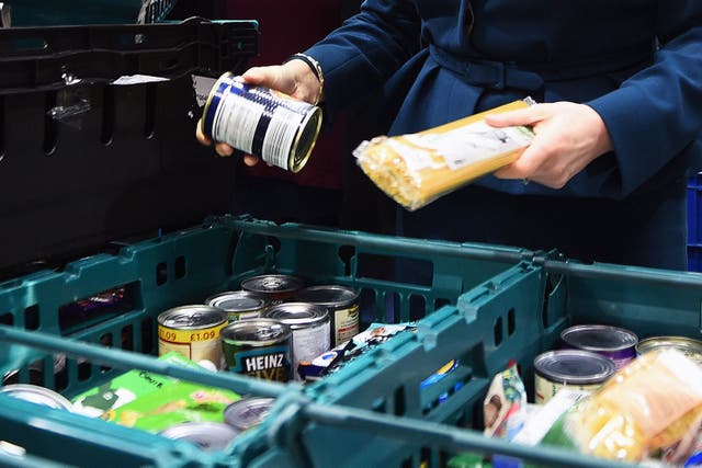 Charities, food banks and local groups are experiencing a drop in donations (Andy Buchanan/PA)
