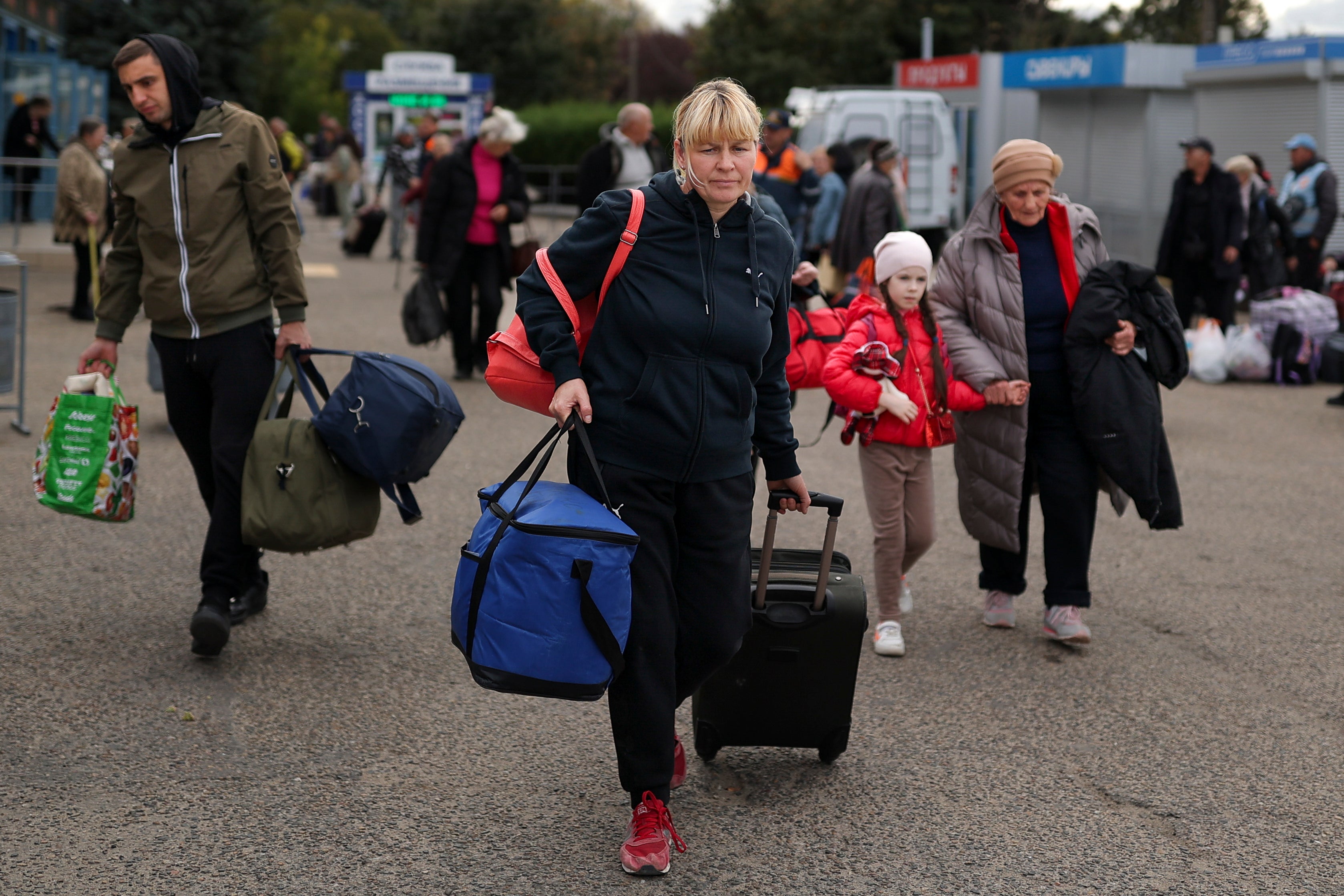 Evacuees from Kherson gather at the railway station in Anapa, southern Russia
