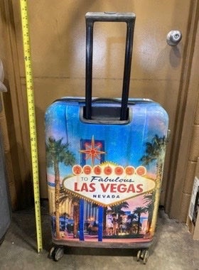 The boy’s body was stuffed inside this “Welcome to fabulous Las Vegas” suitcase