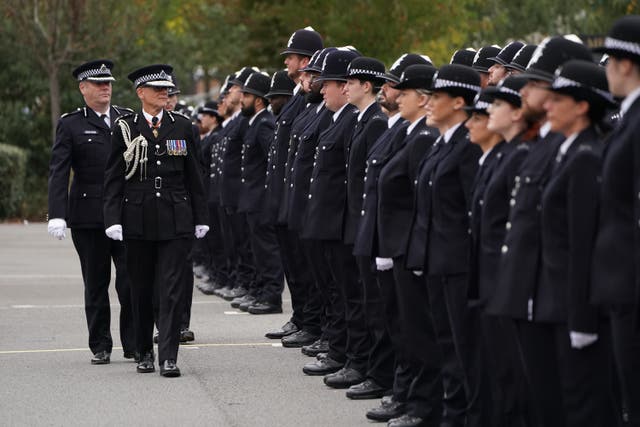 Metropolitan Police Commissioner Mark Rowley inspects new police recruits during his first passing-out parade since taking charge of the force, at Hendon Police Academy (Kirsty O’Connor/PA)