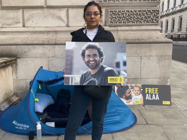 <p>Sanaa Seif, Alaa’s sister, at her sit-in outside the foreign office</p>