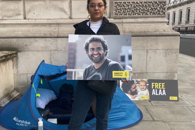<p>Sanaa Seif, Alaa’s sister, at her sit-in outside the foreign office</p>