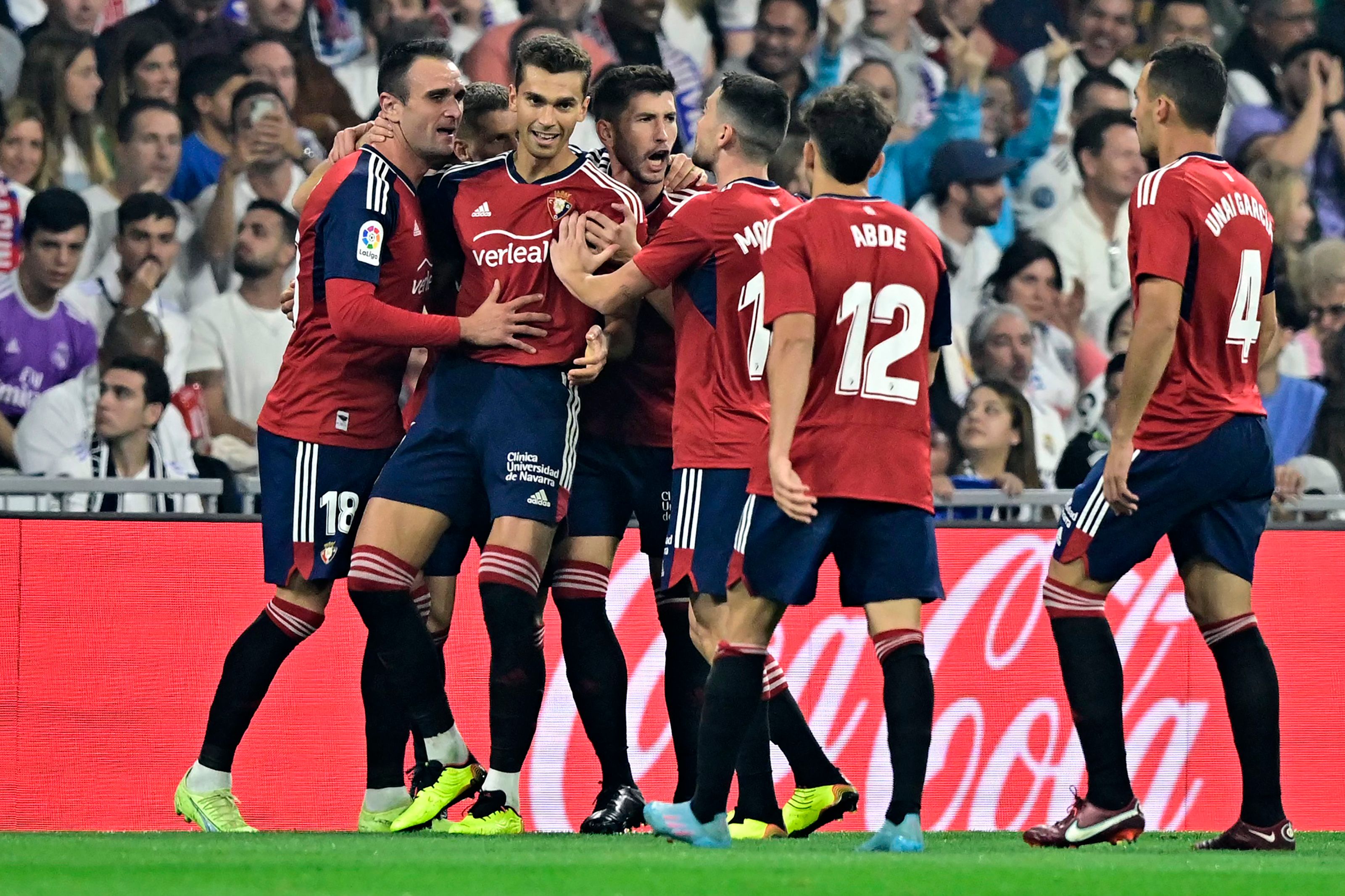 Osasuna’s Spanish forward Kike celebrates scoring against Real Madrid