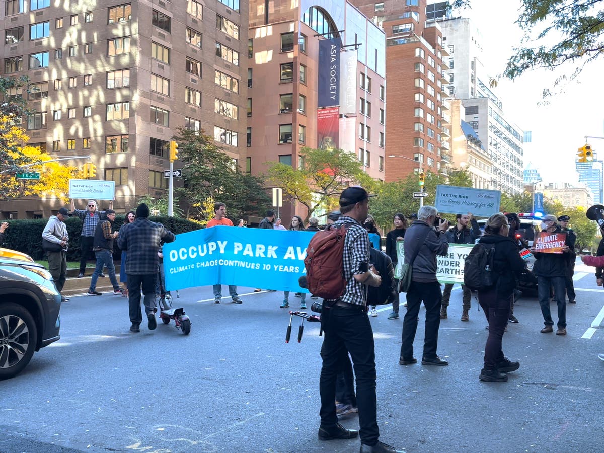 Throwing soup and road blockades: ‘Tax the rich’ climate protests hit one of New York’s wealthiest areas