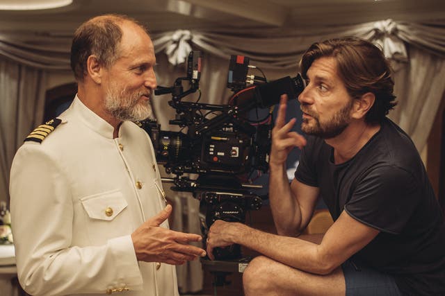 <p>Woody Harrelson and filmmaker Ruben Östlund on the set of ‘Triangle of Sadness’ </p>