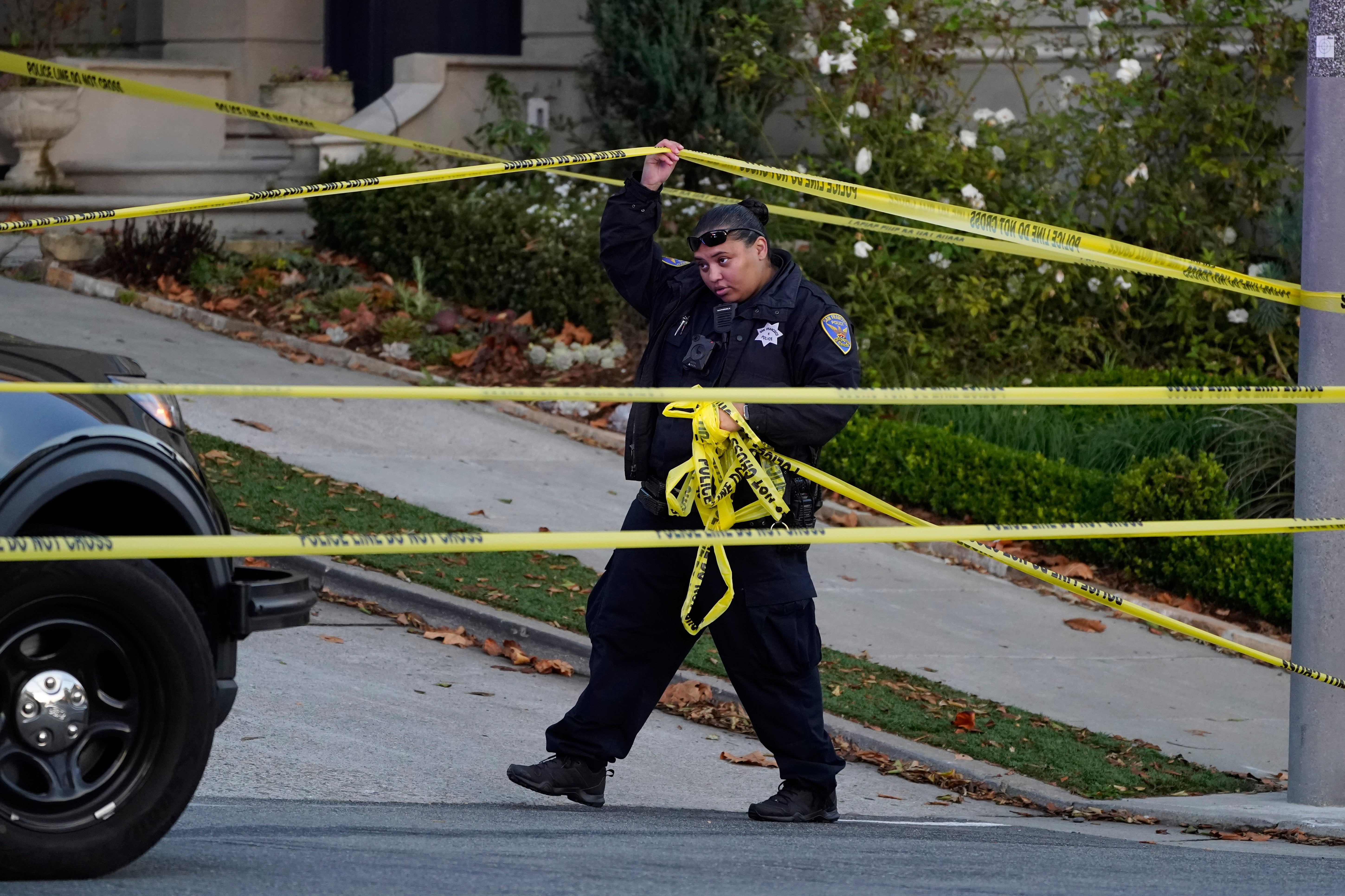 Law enforcement on the scene of the Pelosi home on Friday after the attack