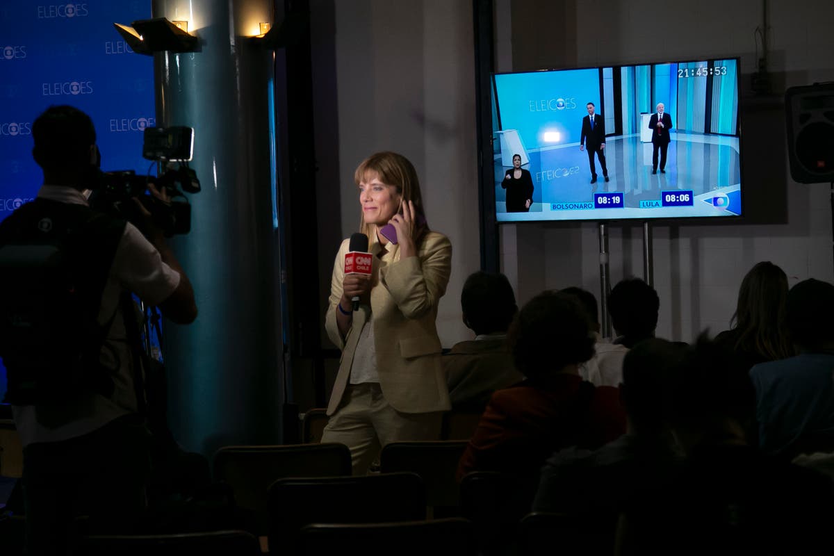 Brazil's Bolsonaro, Lula face off in last debate before vote