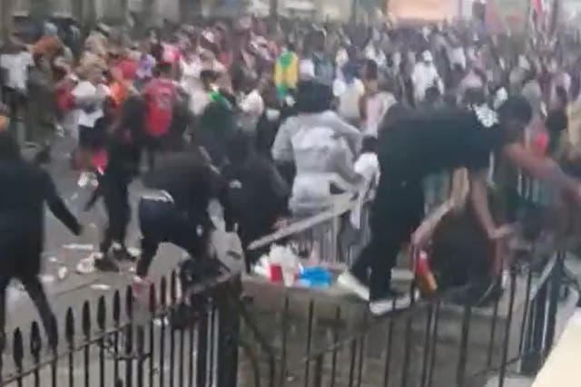 Footage shows the moment a woman was hit in the head at the Notting Hill Carnival in August (Metropolitan Police/PA)