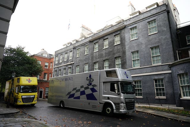 Removal vans in Downing Street on Saturday (Aaron Chown/PA)