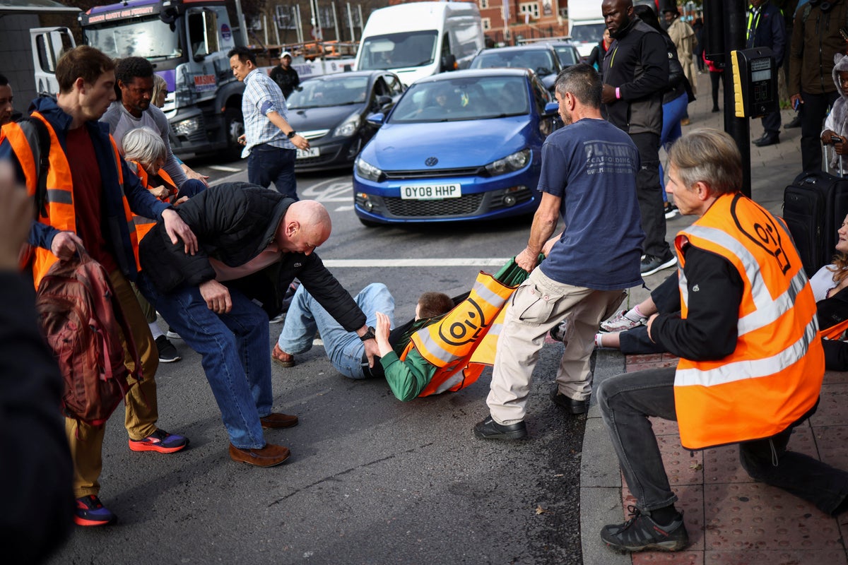 Angry drivers drag Just Stop Oil protesters out of road on 29th day of ...