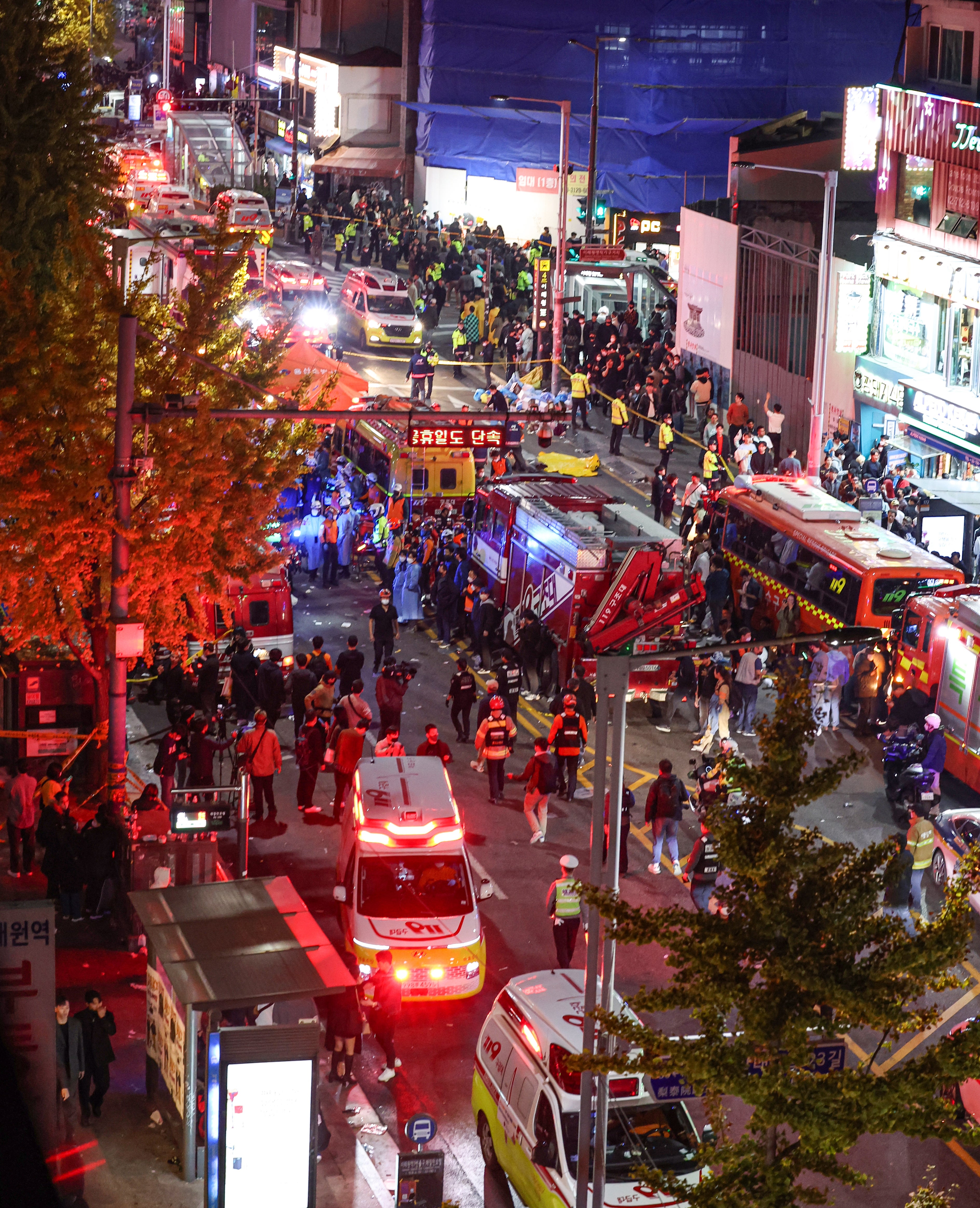 Emergency services at the scene following the crush in Seoul’s Itaewon district