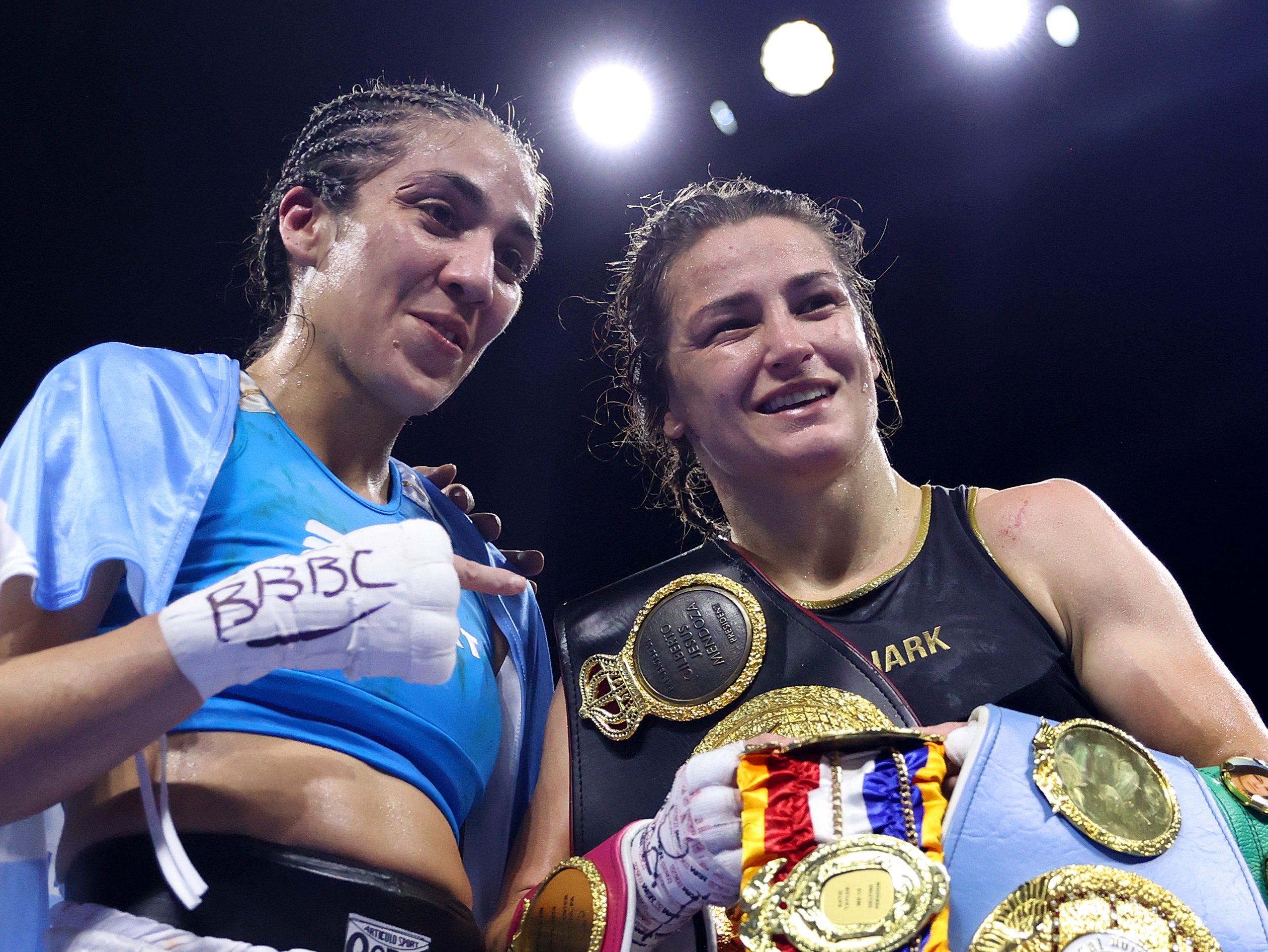 Katie Taylor (right) remained undisputed lightweight champion at London’s Wembley Arena