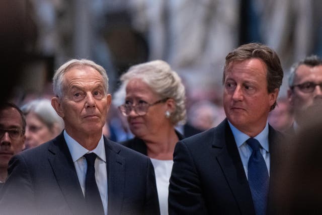 Former prime ministers Tony Blair and David Cameron (Chris J Ratcliffe/PA)