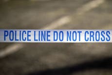 Man, 79, arrested on suspicion of murder after woman found shot dead