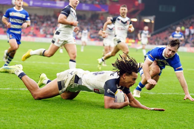 Dom Young scores one of his four tries (Mike Egerton/PA)