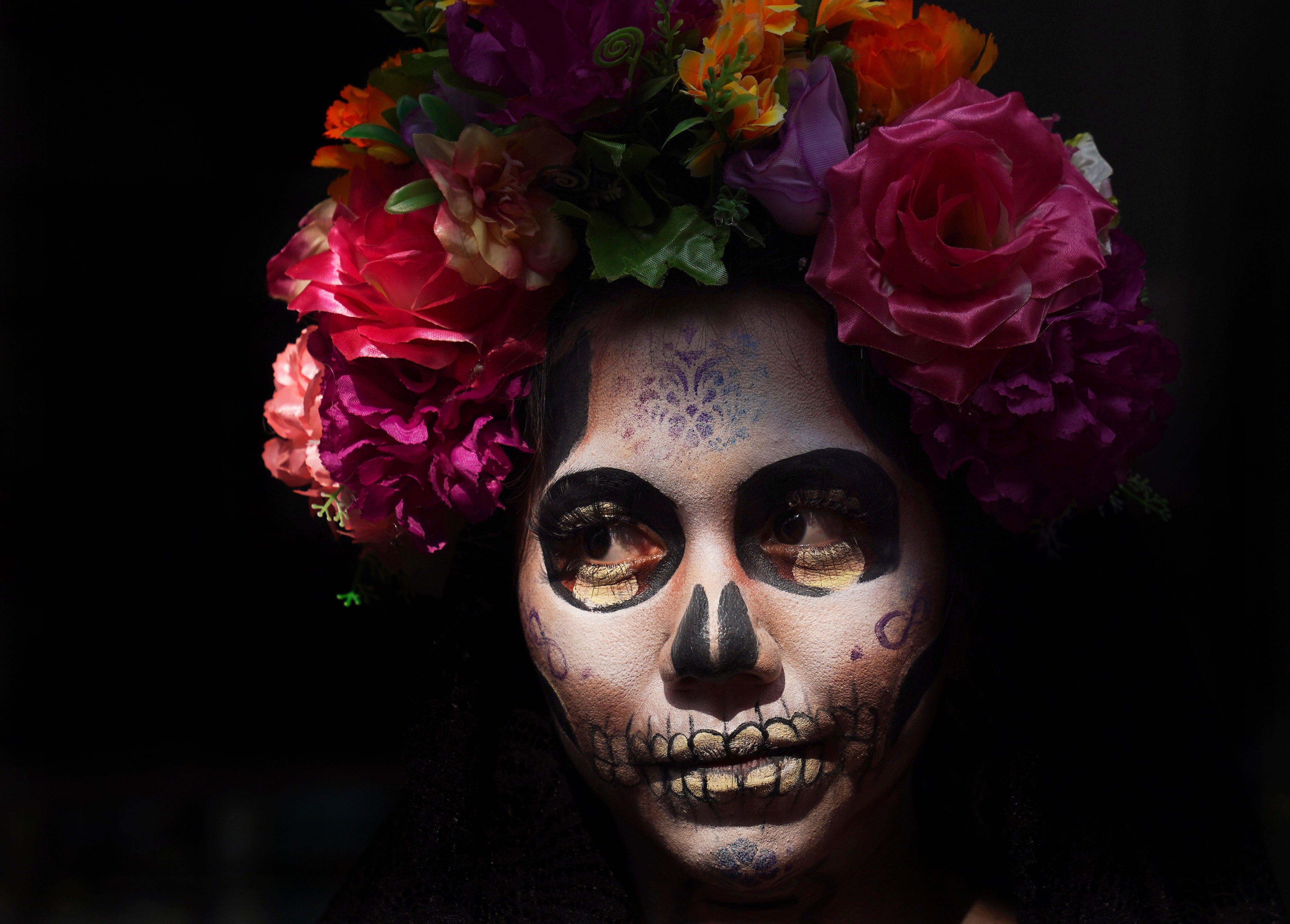 A woman dressed as La Catrina for Day of the Dead