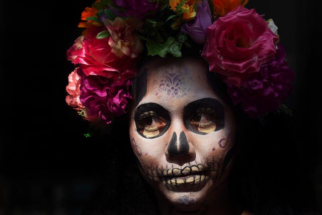 <p>A woman dressed as La Catrina for Day of the Dead </p>