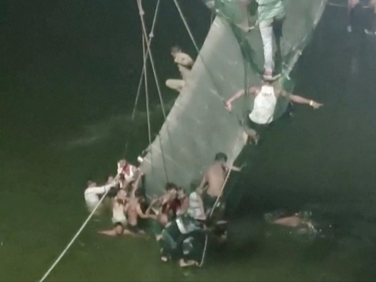 At least 68 killed as suspension bridge collapses in India ‘with 400 people on it’