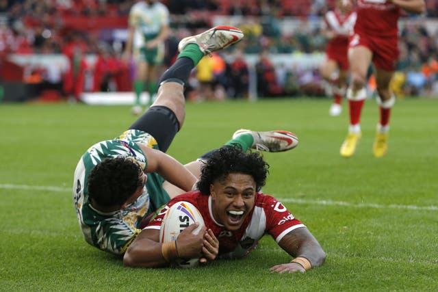 Tesi Niu scored a hat-trick of tries against the Cook Islands (PA)