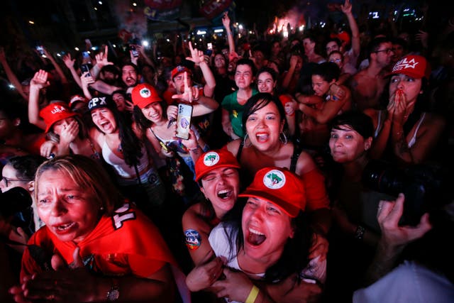<p>Supporters of former Brazilian president Luiz Inacio Lula da Silva react to election results</p>