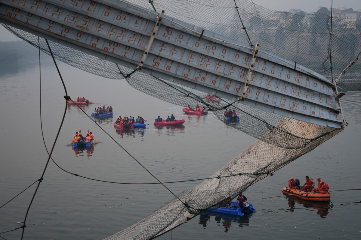 Suspension bridge collapse kills at least 133 in India