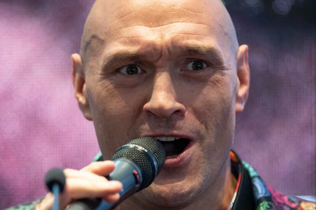 <p>Tyson Fury at a press conference for his upcoming trilogy bout with Derek Chisora</p>