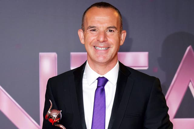 <p>Martin Lewis with the TV Expert award in the winners’ room at the National Television Awards 2022 at OVO Arena Wembley</p>